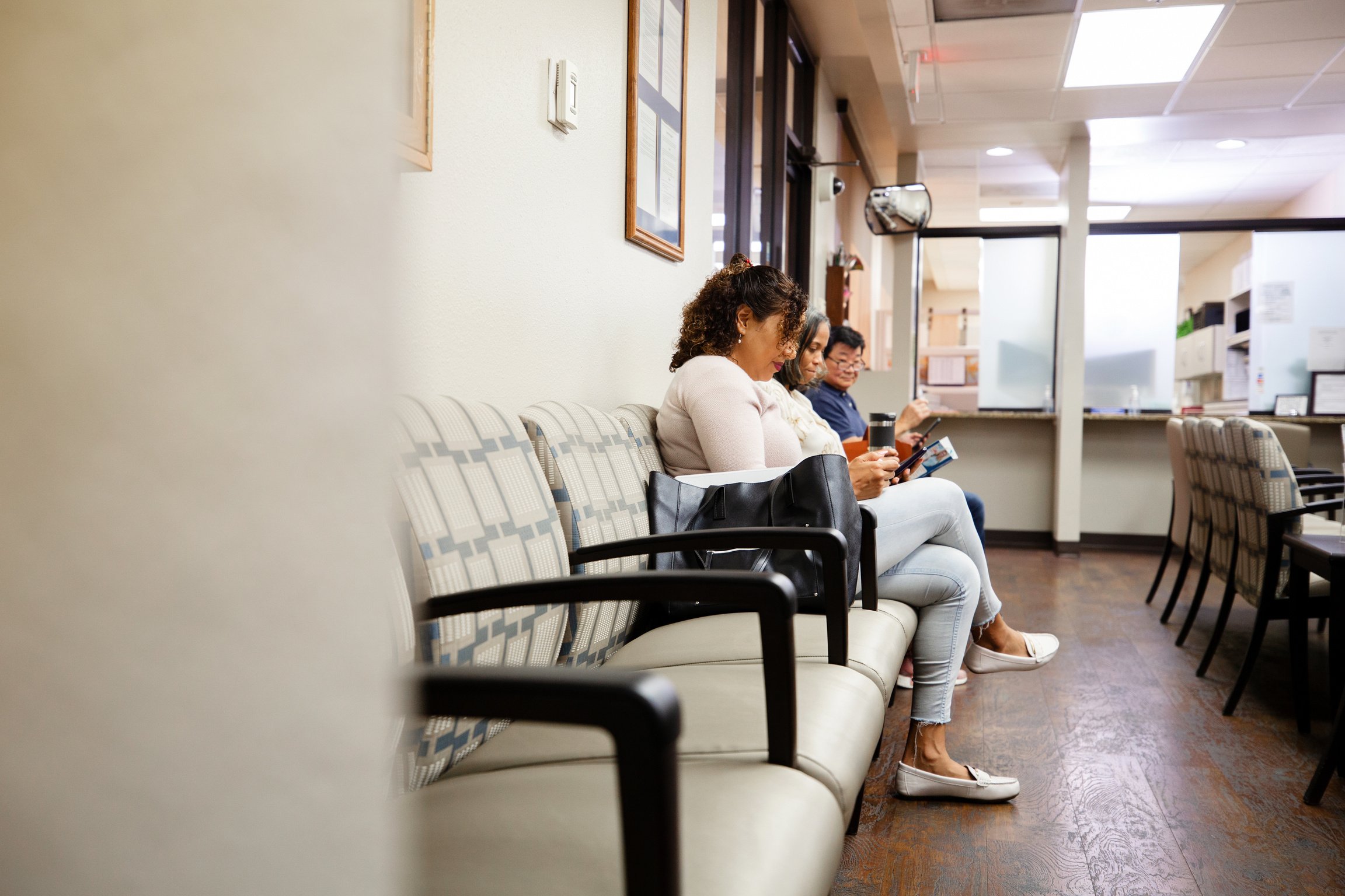 Patients waiting in doctor's office waiting area